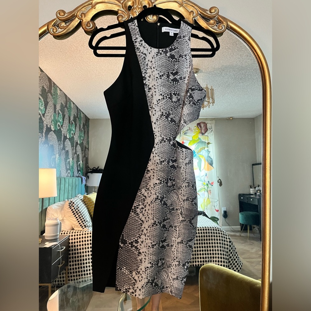 Elizabeth and James black and white dress size 6 with oblique cutout.